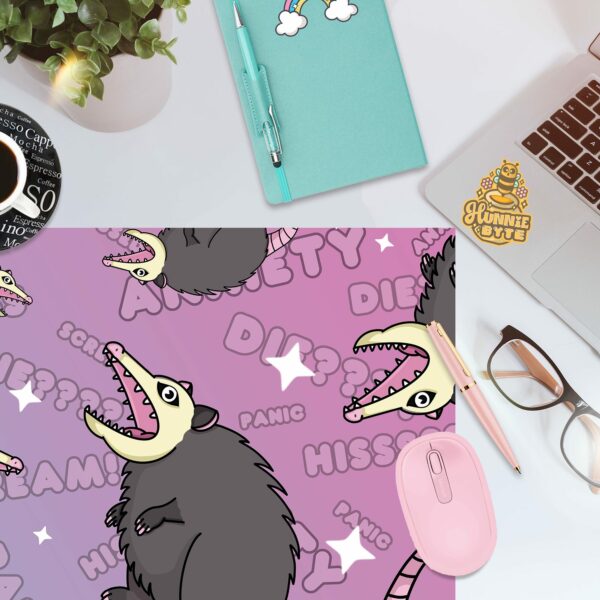 This image shows our adorable desk mat Screaming Possum Deskmat, which is available to purchase from HunnieByte.com