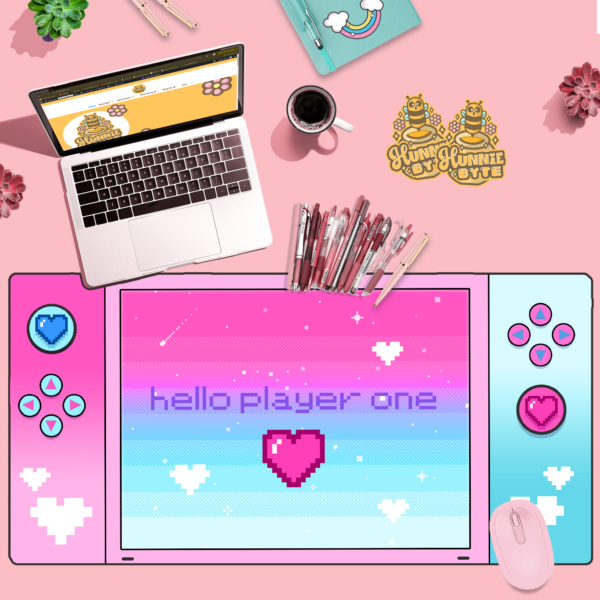 This image shows our adorable desk mat Gamer Pink and Blue Deskmat, which is available to purchase from HunnieByte.com