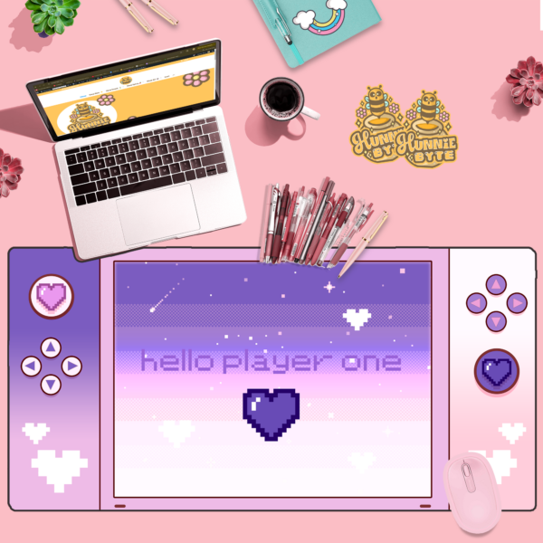 This image shows our adorable desk mat Gamer Pink and Purple Deskmat, which is available to purchase from HunnieByte.com