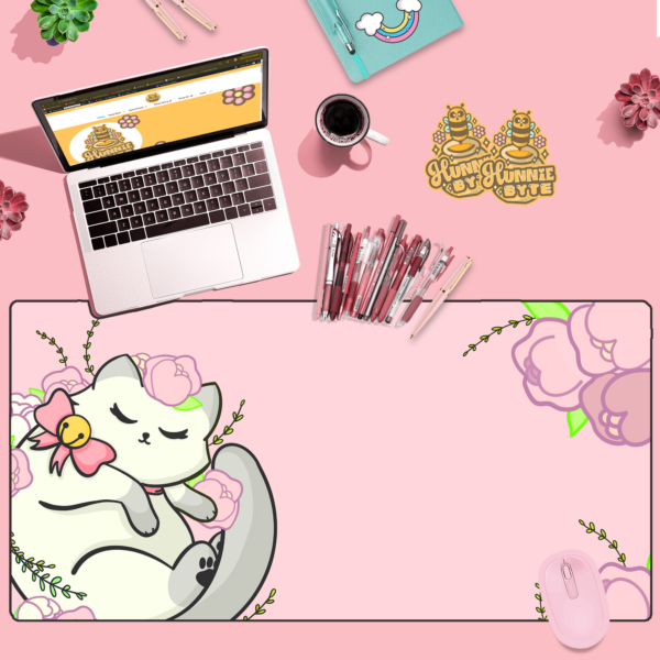 This image shows our adorable desk mat White Kitten and Roses Deskmat, which is available to purchase from HunnieByte.com