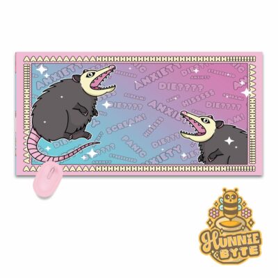 This image shows our adorable desk mat Anxiety Possum Deskmat, which is available to purchase from HunnieByte.com