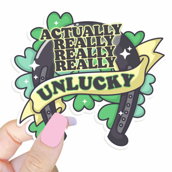 This image shows our adorable sticker finishes, Actually Really Unlucky Sticker, which is available to purchase from HunnieByte.com