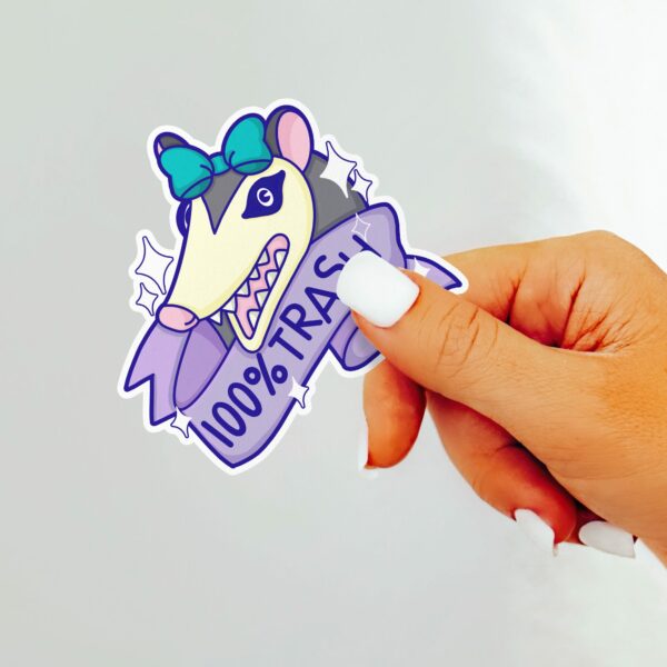 This image shows our adorable sticker, 100 Percent Trash Sticker, which is available to purchase from HunnieByte.com