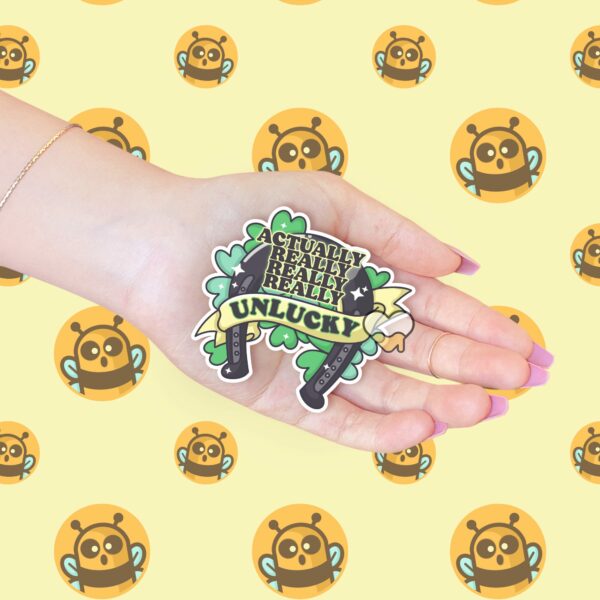 This image shows our adorable sticker finishes, Actually Really Unlucky Sticker, which is available to purchase from HunnieByte.com