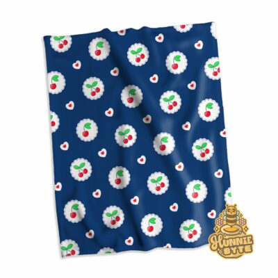 This image shows our Navy Cherry Blanket, which is available to purchase from HunnieByte.com