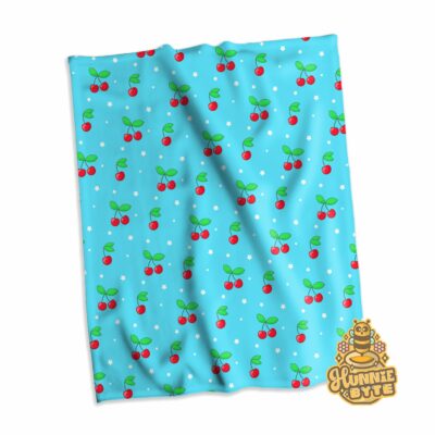 This image shows our Blue Cherry Blanket, which is available to purchase from HunnieByte.com