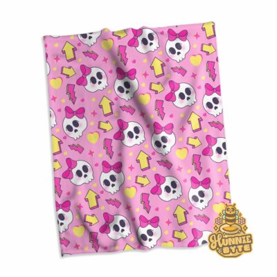 This image shows our 90s Skull and Bows Blanket Pink, which is available to purchase from HunnieByte.com