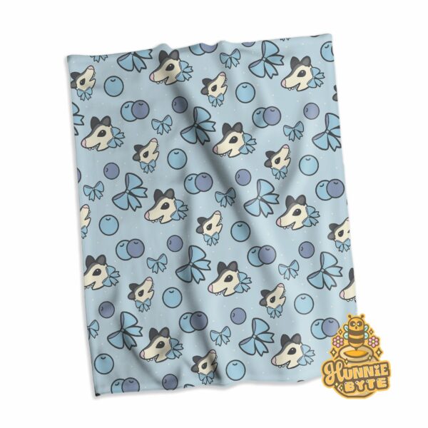 This image shows our Blueberry Possum Blanket, which is available to purchase from HunnieByte.com