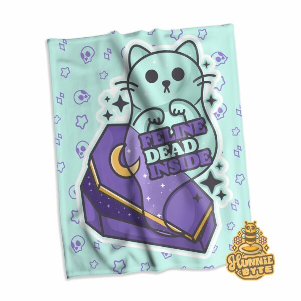 This image shows our Feline Dead Inside Blanket, which is available to purchase from HunnieByte.com