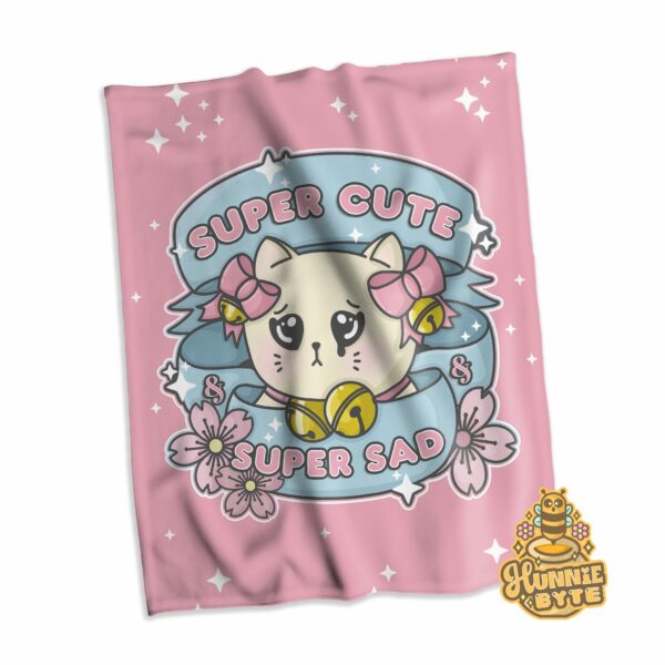 This image shows our Super Cute Super Sad Blanket, which is available to purchase from HunnieByte.com