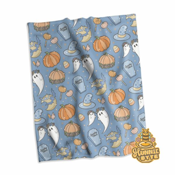 This image shows our Blue Spooks Blanket, which is available to purchase from HunnieByte.com