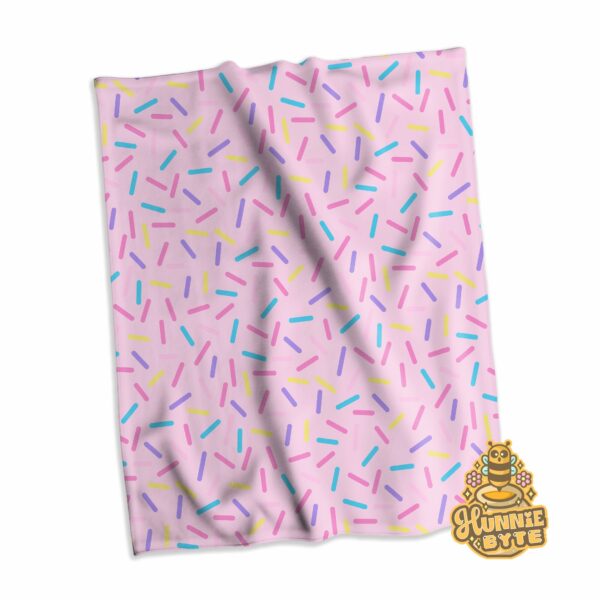 This image shows our Pink Confetti Blanket, which is available to purchase from HunnieByte.com