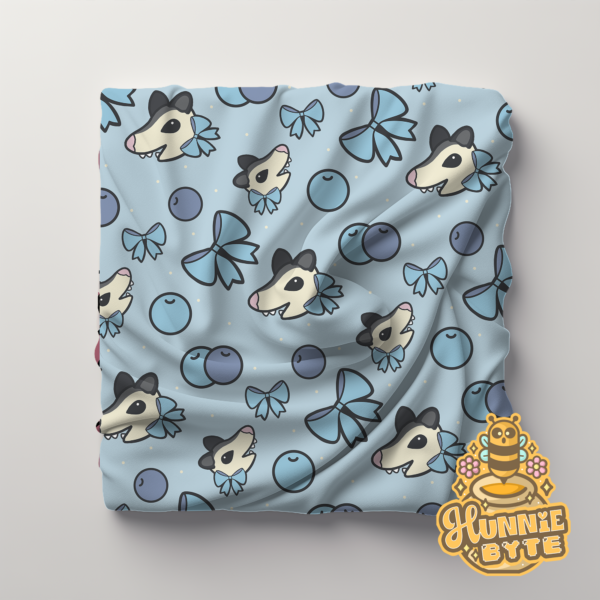 This image shows our Blueberry Possum Blanket, which is available to purchase from HunnieByte.com