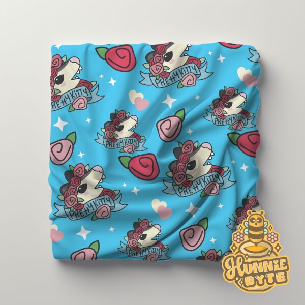 This image shows our Pretty Kitty Possum Blanket, which is available to purchase from HunnieByte.com