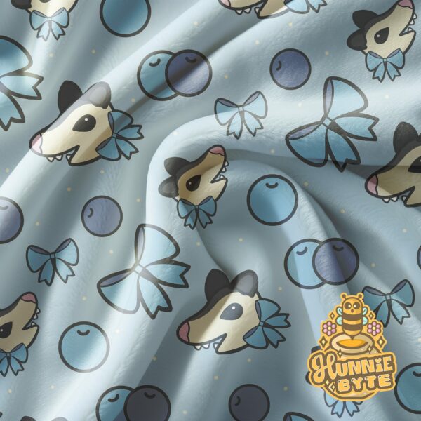 This image shows our Blueberry Possum Blanket, which is available to purchase from HunnieByte.com