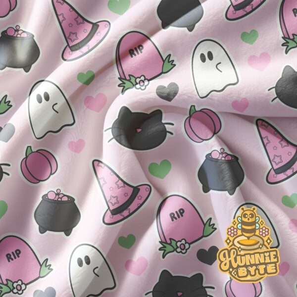 This image shows our Pink Spooks Blanket, which is available to purchase from HunnieByte.com