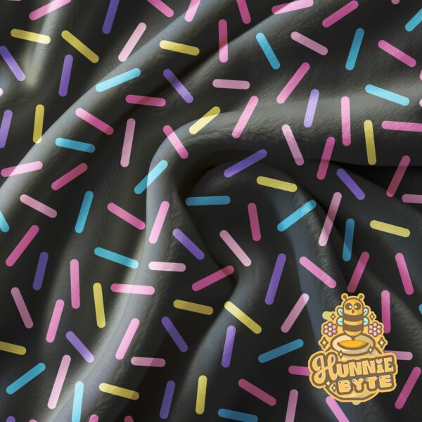 This image shows our Black Confetti Blanket, which is available to purchase from HunnieByte.com