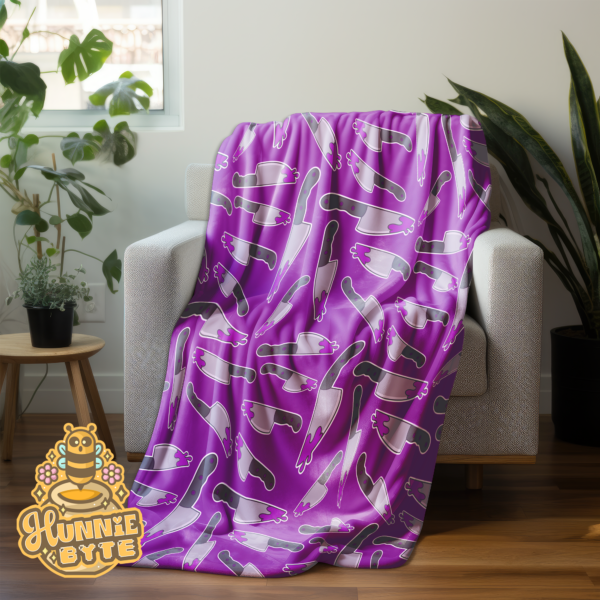 This image shows our Purple Stabby Blanket, which is available to purchase from HunnieByte.com