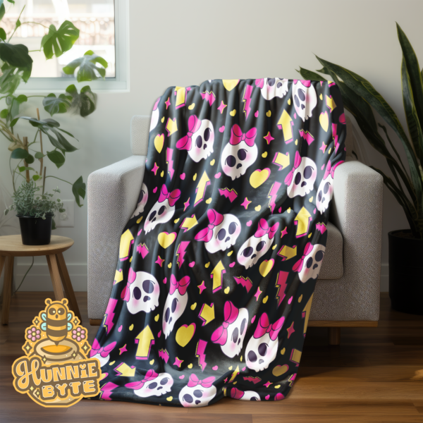 This image shows our 90s Skull and Bows Blanket, which is available to purchase from HunnieByte.com