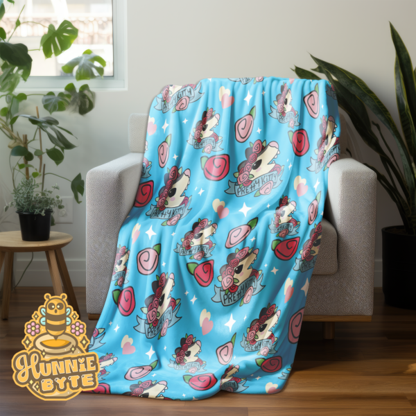 This image shows our Pretty Kitty Possum Blanket, which is available to purchase from HunnieByte.com