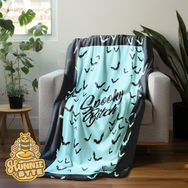 This image shows our Spooky Bitch Blue Blanket, which is available to purchase from HunnieByte.com