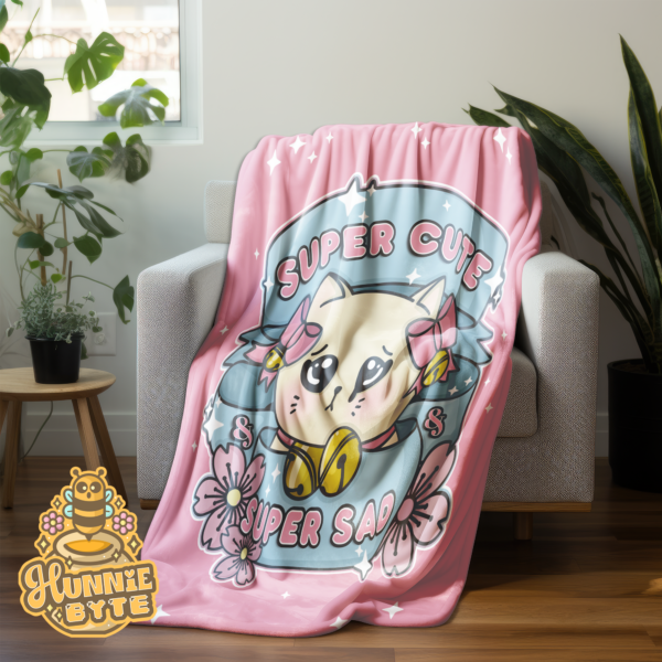 This image shows our Super Cute Super Sad Blanket, which is available to purchase from HunnieByte.com