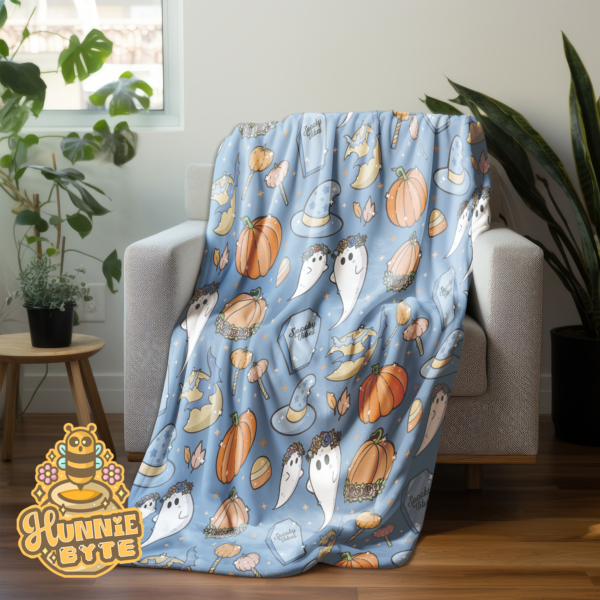 This image shows our Blue Spooks Blanket, which is available to purchase from HunnieByte.com