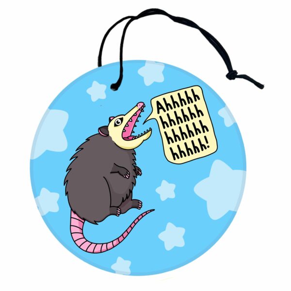 This image shows a hand-drawn adorable air freshener, Ahhh Anxiety Possum Freshener, which is available to purchase from HunnieByte.com