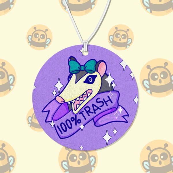 This image shows a hand-drawn adorable air freshener, 100% Trash Possum Air Freshener, which is available to purchase from HunnieByte.com