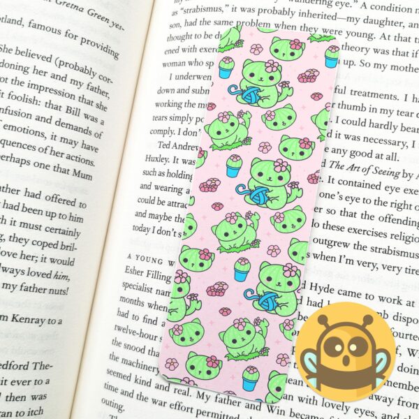 This image shows an hand-drawn adorable bookmark, Cacticat Pink and Cactus Bookmark, which is available to purchase from HunnieByte.com