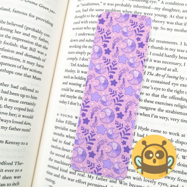 This image shows an hand-drawn adorable bookmark, Celestial Moon Purple Bookmark, which is available to purchase from HunnieByte.com