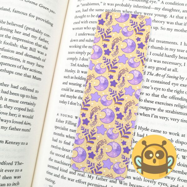 This image shows an hand-drawn adorable bookmark, Celestial Moon Purple and Gold Bookmark, which is available to purchase from HunnieByte.com