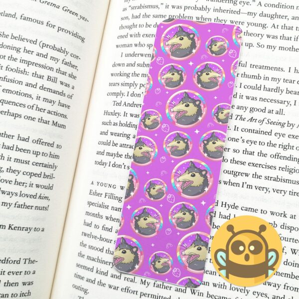 This image shows an hand-drawn adorable bookmark, Rainbow Possum Bookmark, which is available to purchase from HunnieByte.com