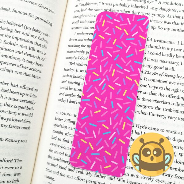 This image shows an hand-drawn adorable bookmark, Confetti Pink Bookmark, which is available to purchase from HunnieByte.com