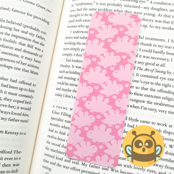 This image shows an hand-drawn adorable bookmark, Cute Dinos Stegosaurus Bookmark, which is available to purchase from HunnieByte.com