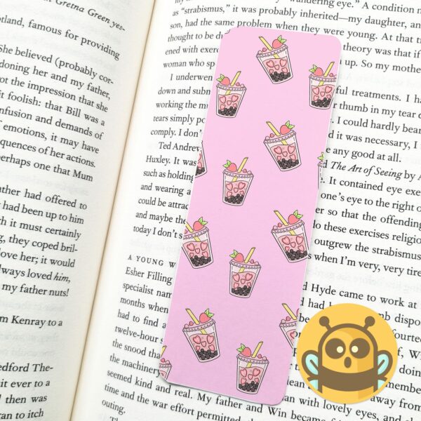 This image shows an hand-drawn adorable bookmark, Strawberry Boba Bookmark, which is available to purchase from HunnieByte.com