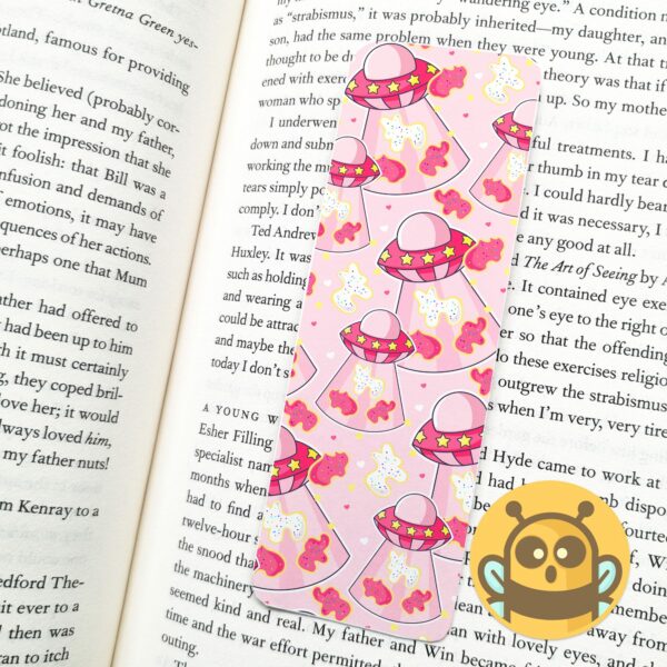 This image shows an hand-drawn adorable bookmark, UFO Animal Cookie Bookmark, which is available to purchase from HunnieByte.com