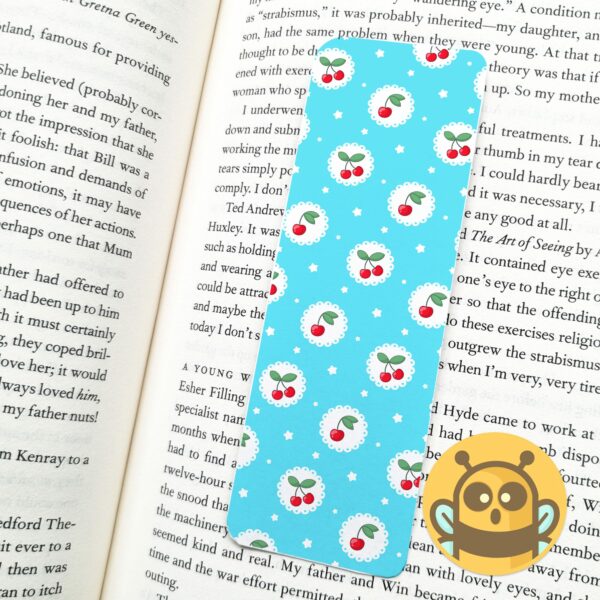 This image shows an hand-drawn adorable bookmark, Vintage Blue Cherry Bookmark, which is available to purchase from HunnieByte.com