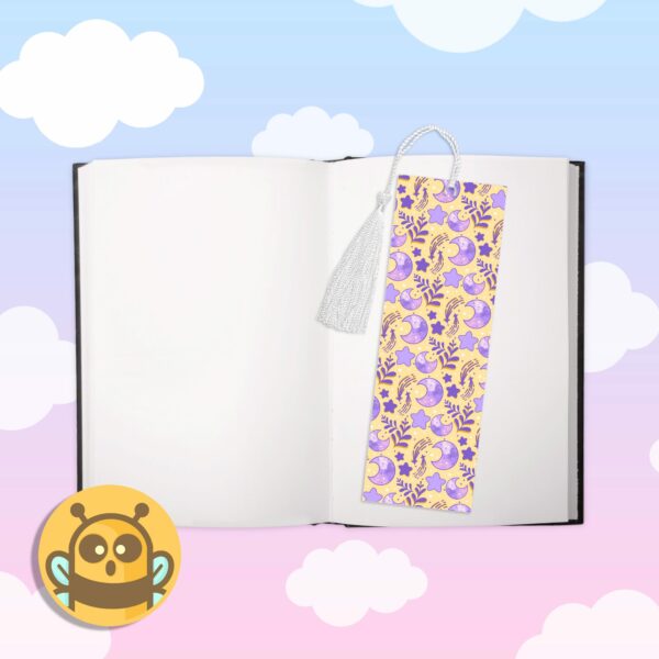 This image shows an hand-drawn adorable bookmark, Celestial Moon Purple and Gold Bookmark, which is available to purchase from HunnieByte.com