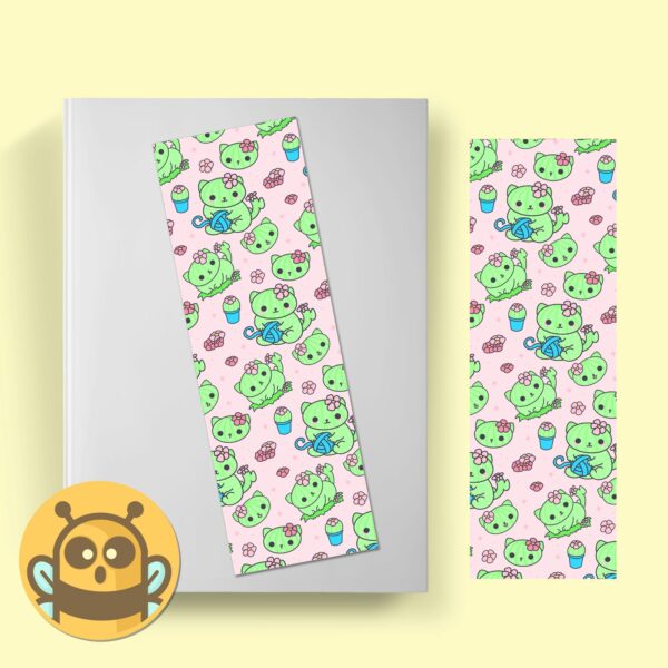 This image shows an hand-drawn adorable bookmark, Cacticat Pink and Cactus Bookmark, which is available to purchase from HunnieByte.com