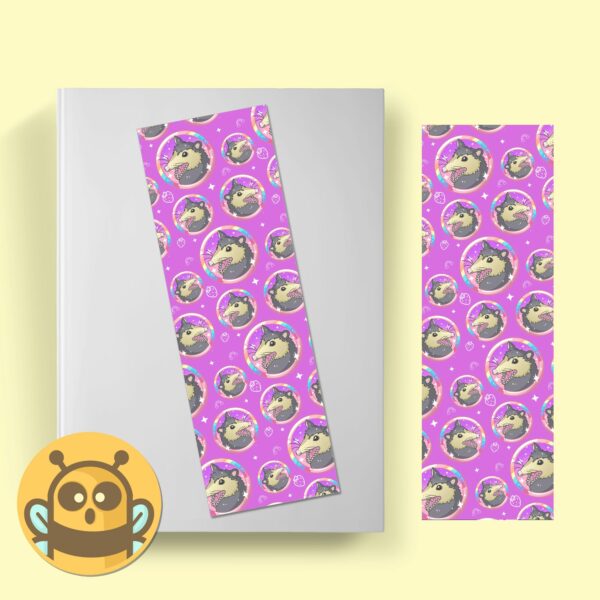 This image shows an hand-drawn adorable bookmark, Rainbow Possum Bookmark, which is available to purchase from HunnieByte.com