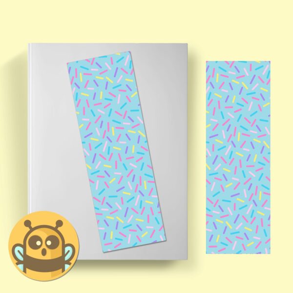 This image shows an hand-drawn adorable bookmark, Confetti Blue Bookmark, which is available to purchase from HunnieByte.com