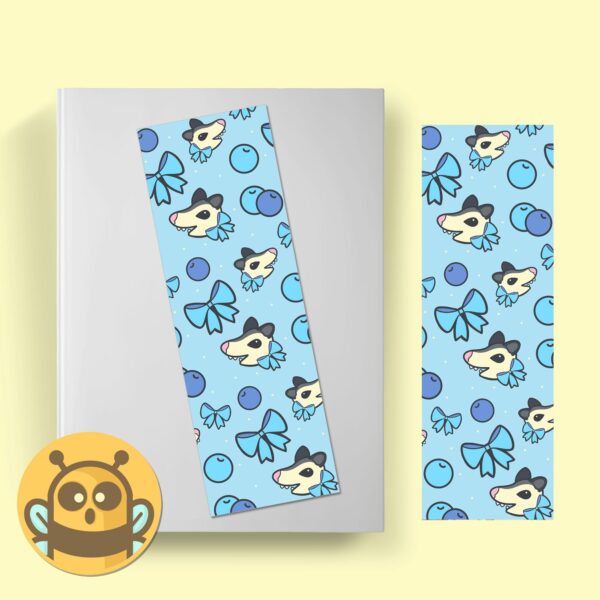 This image shows an hand-drawn adorable bookmark, Blueberry Possum Bookmark, which is available to purchase from HunnieByte.com