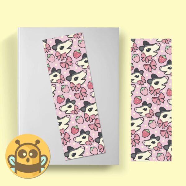 This image shows an hand-drawn adorable bookmark, Strawberry Possum Bookmark, which is available to purchase from HunnieByte.com