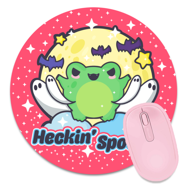 This image shows an hand-drawn adorable mousepad, Heckin Spooky Frog Mousepad, which is available to purchase from HunnieByte.com