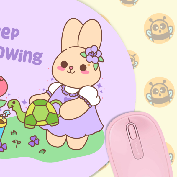 This image shows an hand-drawn adorable mousepad, Lavender The Bunny Keep Growing Mousepad, which is available to purchase from HunnieByte.com