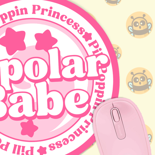 This image shows an hand-drawn adorable mousepad, Bipolar Babe Mousepad, which is available to purchase from HunnieByte.com