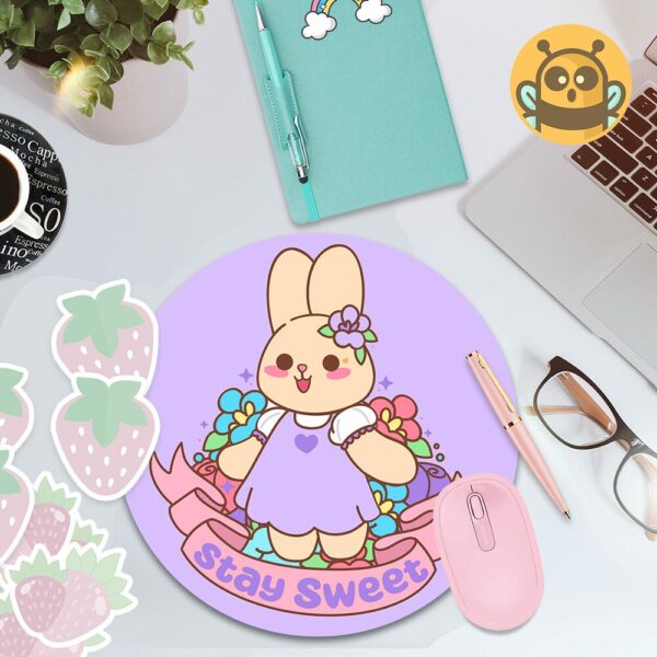 This image shows an hand-drawn adorable mousepad, Lavender The Bunny Stay Sweet Mousepad, which is available to purchase from HunnieByte.com