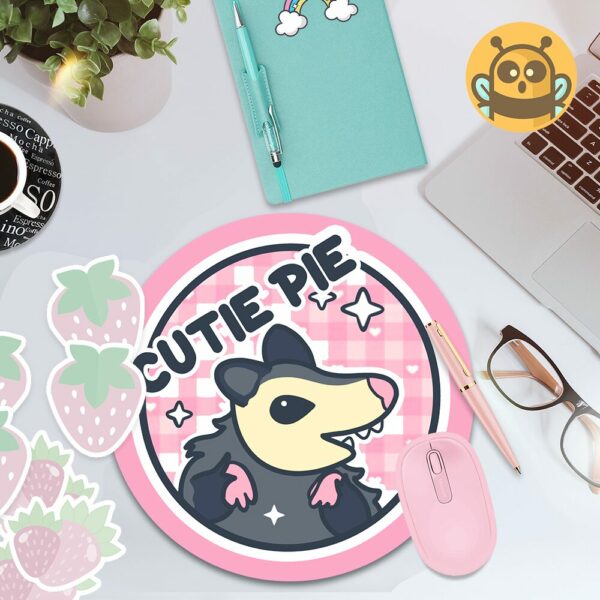 This image shows an hand-drawn adorable mousepad, Cutie Pie Possum Mousepad, which is available to purchase from HunnieByte.com