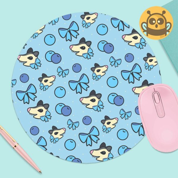 This image shows an hand-drawn adorable mousepad, Blueberry Possum Mousepad, which is available to purchase from HunnieByte.com